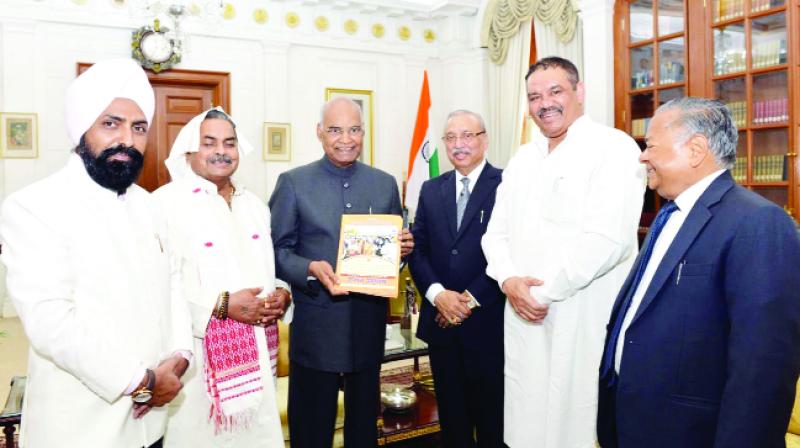 Ram Nath Kovind presenting Magazine Ram Nath Kovind presenting Magazine