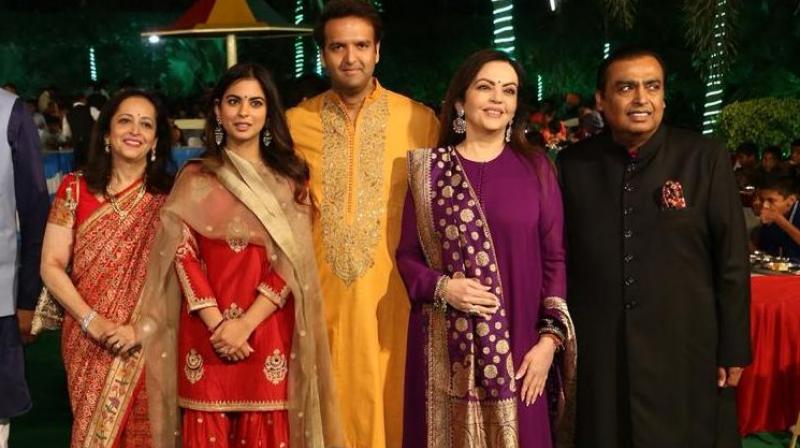 Isha Ambani with Mukesh Ambani Isha Ambani with Mukesh Ambani