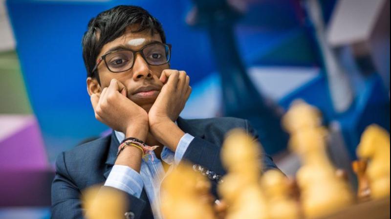 Praggnanandhaa defeats Ding Liren at Tata Steel Chess Tournament Praggnanandhaa defeats Ding Liren at Tata Steel Chess Tournament