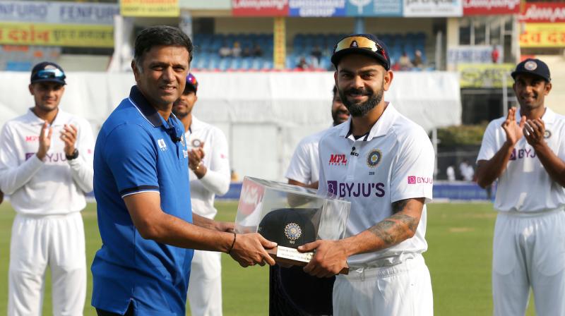 Virat Kohli felicitated with a special cap by India coach Rahul Dravid on his 100th Test