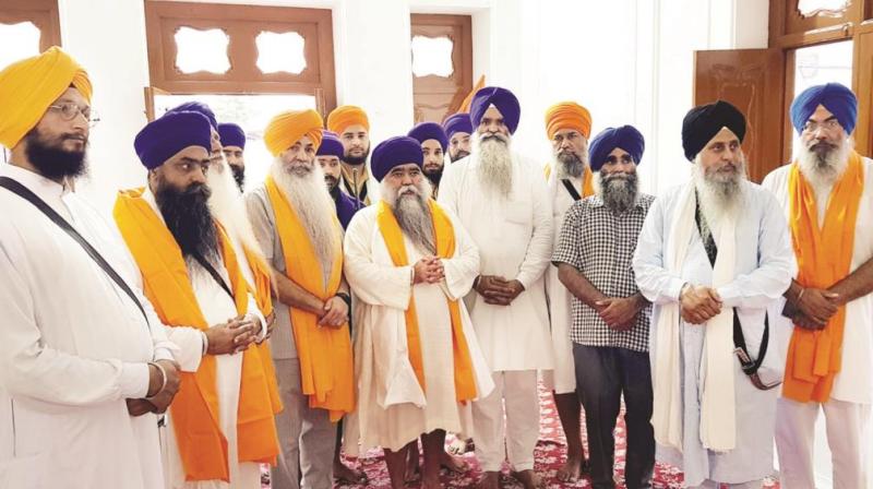 Harnam Singh Khalsa and others