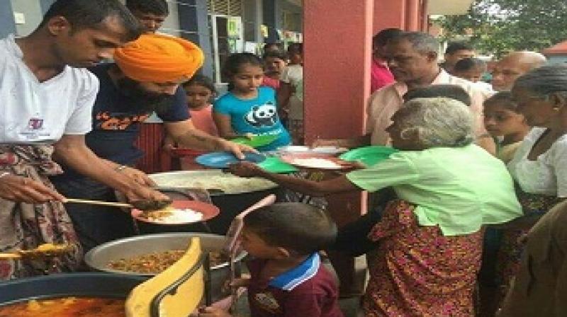 Khalsa Aid volunteers reach Kochi