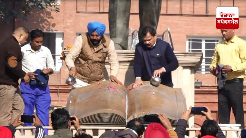 MPs Gurjit Singh Aujla and Raj Kumar Verka bathed Dr. Ambedkar's statue with milk MPs Gurjit Singh Aujla and Raj Kumar Verka bathed Dr. Ambedkar's statue with milk