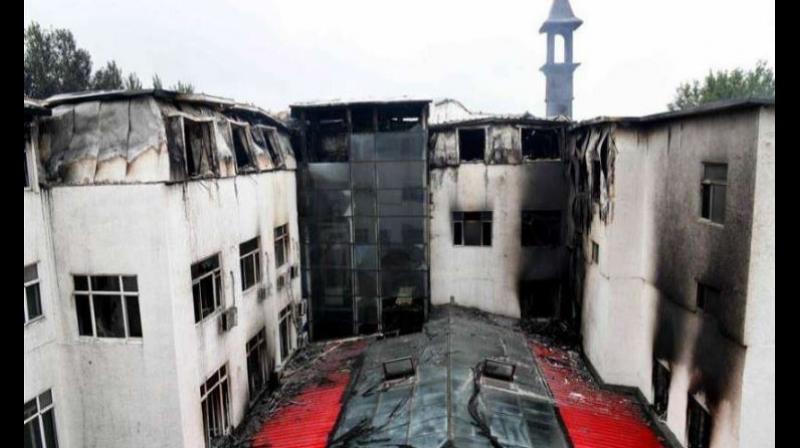 hotel on fire in China hotel on fire in China
