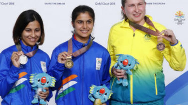 CWG-2018 :indias punam yadav and manu bhakar wins gold weightlifting and air pistol
