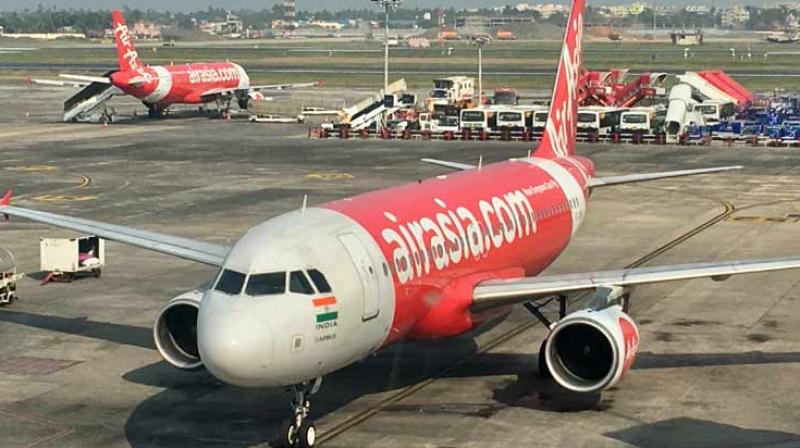 DGCA imposes Rs 20 lakh fine on Air Asia (File) DGCA imposes Rs 20 lakh fine on Air Asia (File)