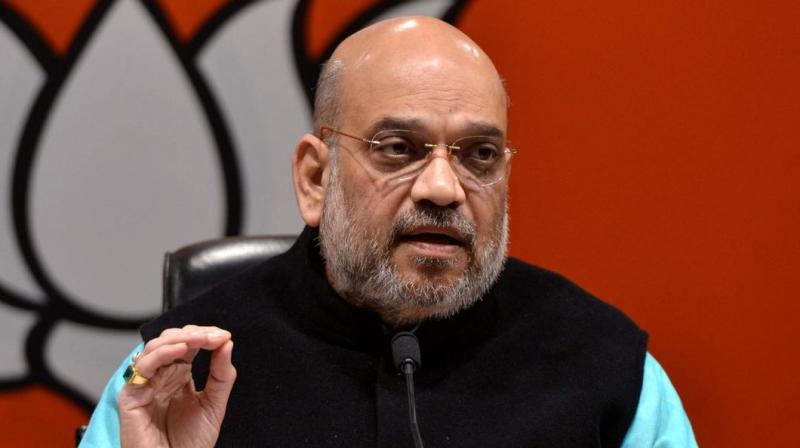 Amit Shah to continue AS chief of BJP