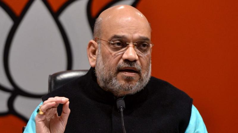 Amit Shah to continue AS chief of BJP Amit Shah to continue AS chief of BJP