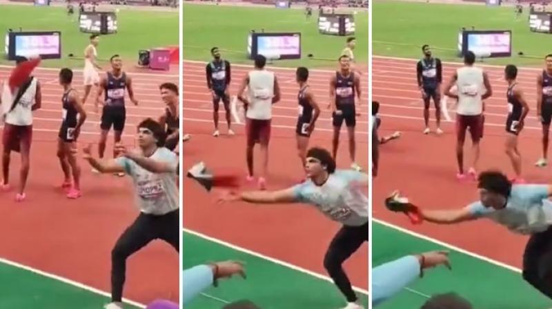 Neeraj Chopra Catches Indian Flag From Falling on Ground! Neeraj Chopra Catches Indian Flag From Falling on Ground!