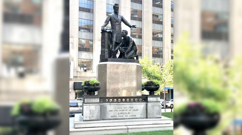  Boston removes a statue of a slave kneeling in front of a statue of Lincoln