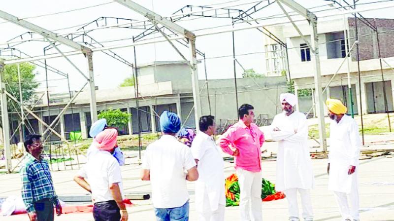 Manpreet Singh Badal is reviewing the rally place