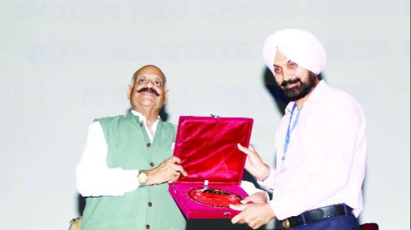 Rajpal honoring Ranjit Singh Gill