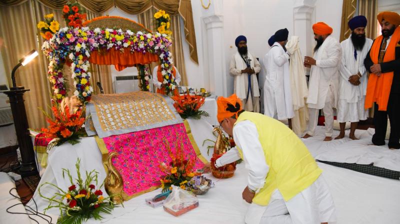 CM Pushkar Singh Dhami participated in 'Akhand Path' organised by Governor CM Pushkar Singh Dhami participated in 'Akhand Path' organised by Governor