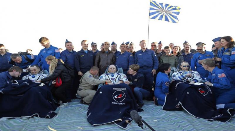 ISS astronauts return to earth 