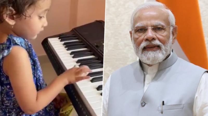 PM Modi shares viral video of little girl playing piano PM Modi shares viral video of little girl playing piano