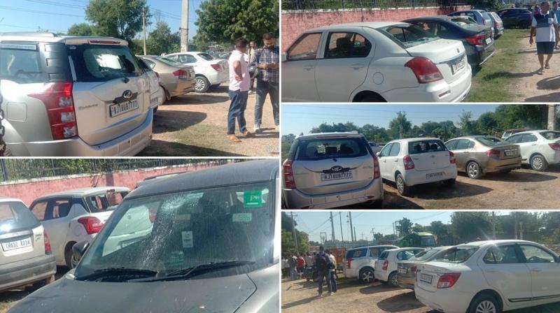 Unidentified persons broke the windows of two dozen vehicles Unidentified persons broke the windows of two dozen vehicles