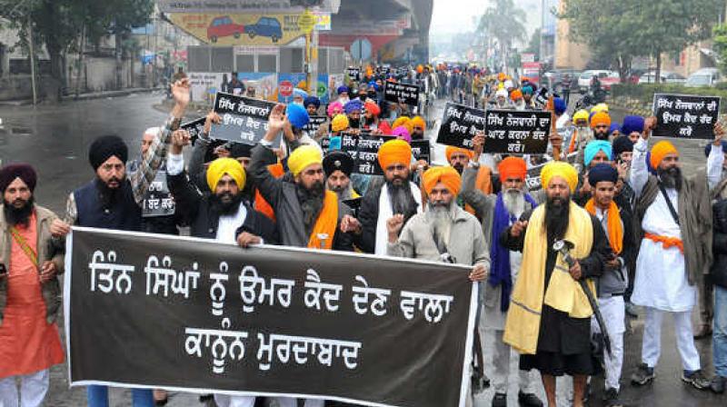 The Sikhs, while performing their protest