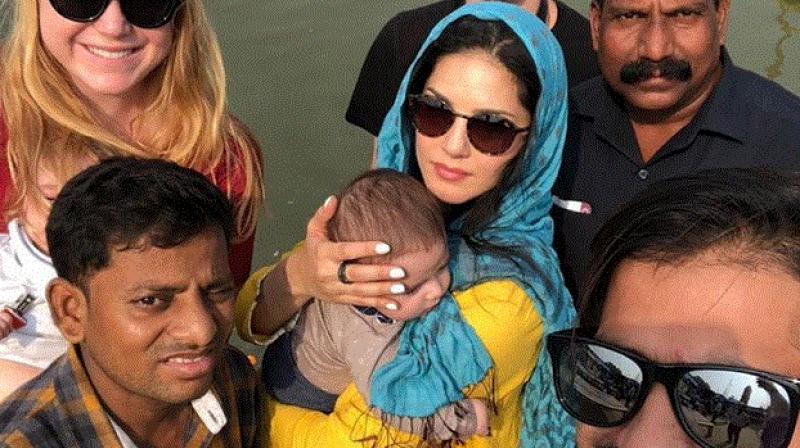Sunny Leone takes her sons to immerse her parents’ ashes in Ganga Sunny Leone takes her sons to immerse her parents’ ashes in Ganga
