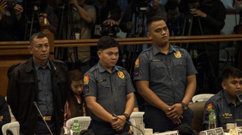 police officers Arnel Oares, Jerwin Cruz and Jeremias Pereda