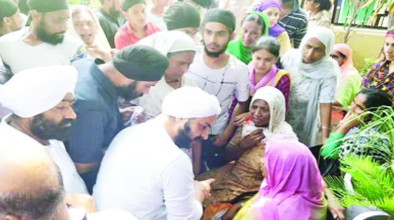 Jarnail Singh with Victims family
