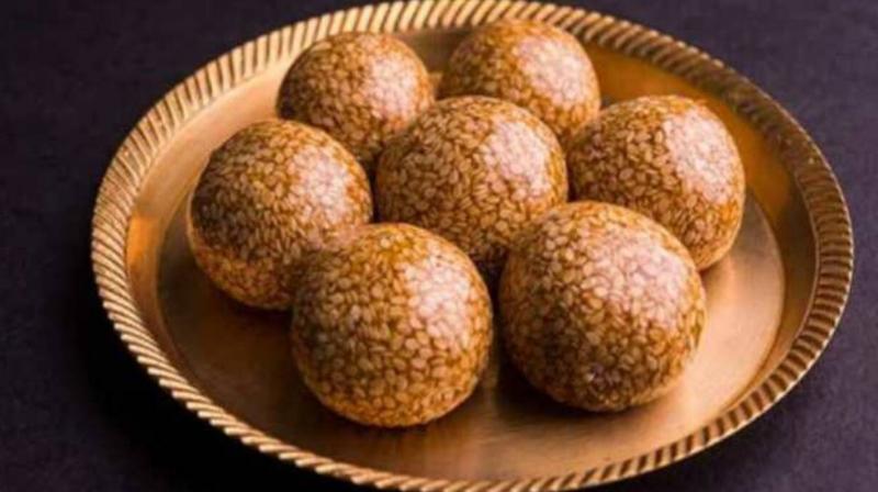 Eating Til Laddu has many benefits for the body Eating Til Laddu has many benefits for the body
