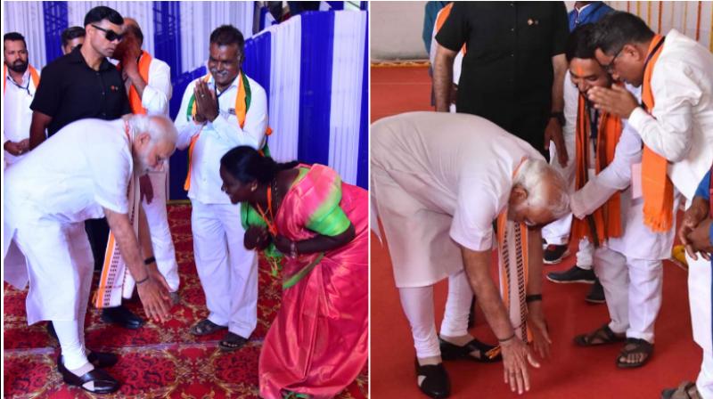 Modi bows at feet of woman functionary, VHP leader during Karnataka visit Modi bows at feet of woman functionary, VHP leader during Karnataka visit