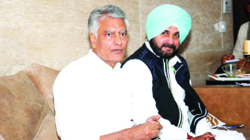 Sunil Jakhar and Navjot Singh Sidhu talking to reporters