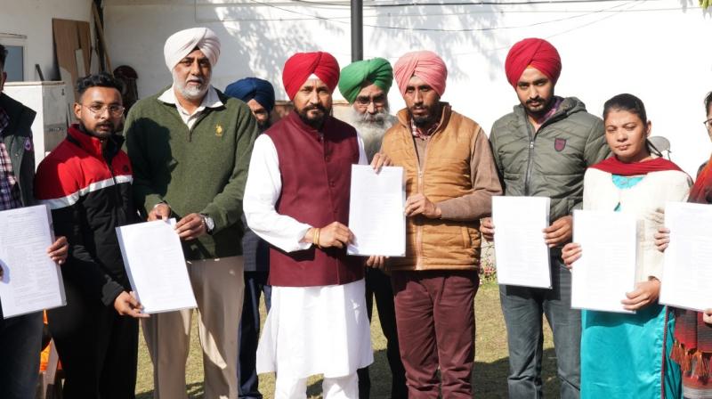 Punjab CM hands over appointment letters to 11 family memeber of farmers losing their lives in Anti Farm Law Movement Punjab CM hands over appointment letters to 11 family memeber of farmers losing their lives in Anti Farm Law Movement