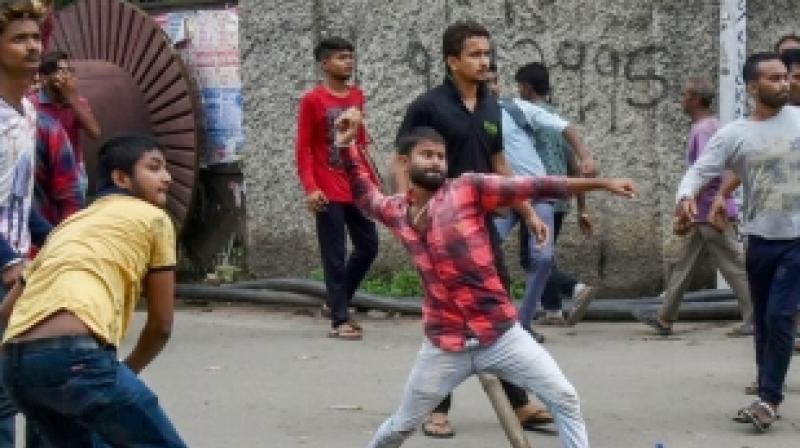 Workers beaten in UP for eating meat in temple premise Workers beaten in UP for eating meat in temple premise
