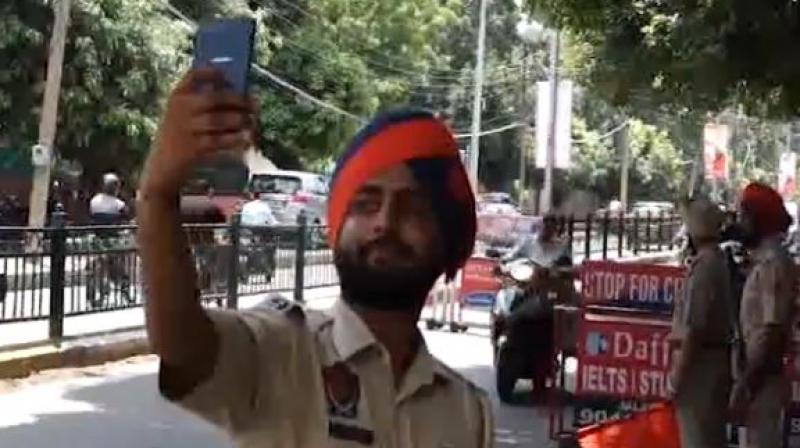 Punjab policemen to mark their attendance with a selfie everyday now Punjab policemen to mark their attendance with a selfie everyday now