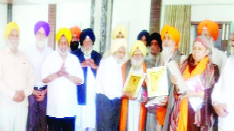  While honoring Bhai Avtar Singh with Siropa, President Nirmal Singh, Swinder Singh Kathunangal, Surinder Singh Rumalayali