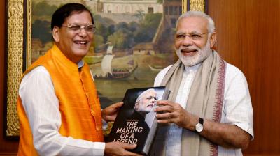 New Delhi:  In this Friday, Aug. 18, 2023, file photo, Prime Minister Narendra Modi receives a book written on him with title 'Narendra Modi: The Making of A Legend" from its author, Sulabh International founder Bindeshwar Pathak in New Delhi. (PTI Photo)