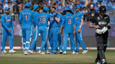 Dharamshala: India's bowler Mohammed Shami celebrates with teammates after the wicket of New Zealand's batter Will Young during the ICC Men's Cricket World Cup 2023 match between India and New Zealand, at the HPCA Stadium in Dharamshala, Sunday, Oct. 22, 2023. (PTI Photo/Vijay Verma)