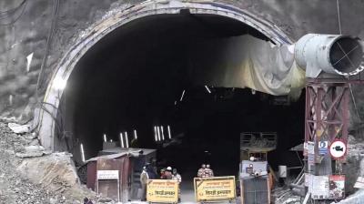 Uttarkashi: Security forces personnel guard as rescue work continues after a portion of an under construction tunnel between Silkyara and Dandalgaon on the Brahmakhal-Yamunotri national highway collapsed, in Uttarkashi district, Wednesday, Nov. 15, 2023. (PTI Photo) 
