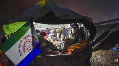 Fatehgarh Sahib: Farmers in a trolley ahead of their scheduled march towards Delhi, in Fatehgarh Sahib, Monday, Feb. 12, 2024. Several farmer associations, mostly from Uttar Pradesh, Haryana and Punjab, have called for the march on February 13 to demand a law guaranteeing MSP for their produce, one of the conditions they had set when they agreed to withdraw their agitation in 2021. (PTI Photo)