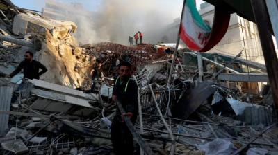 Emergency services work at the consulate building.