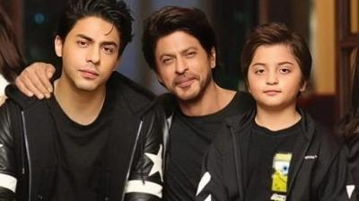 Shahrukh Khan with Aryan Khan and Abram Khan.