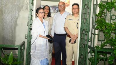 West Bengal Chief Minister Mamata Banerjee at her residence with senior officials.