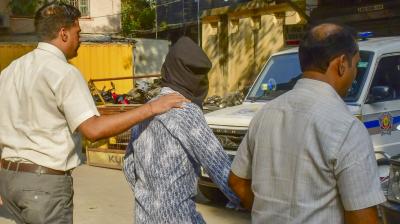 Mumbai: Crime Branch personnel take an accused in the Baba Siddiqui murder case to produce before the Esplanade court, in Mumbai, Wednesday, Nov. 6, 2024. (PTI Photo)