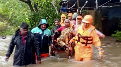 Puducherry: NDRF personnel evacuate a resident from a flooded area in the aftermath of Cyclone Fengal, in Puducherry, Sunday, Dec. 1, 2024. (PTI Photo)