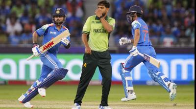 Dubai: India's Virat Kohli and Shubman Gill run between the wickets during a One Day International (ODI) cricket match of the ICC Champions Trophy between India and Pakistan, at Dubai International Cricket Stadium, in Dubai, UAE, Sunday, Feb. 23, 2025. (PTI Photo/Kamal Kishore)