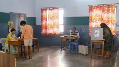 Gurugram: A voter casts vote at a polling booth during the Haryana municipal elections, in Gurugram, Sunday, March 2, 2025. (PTI Photo)