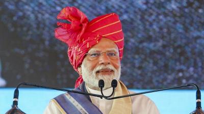 In this image from PMO on Monday, April 14, 2025, Prime Minister Narendra Modi speaks during the inauguration and foundation stone laying ceremony of various development projects, in Yamuna Nagar, Haryana. (PMO via PTI Photo)