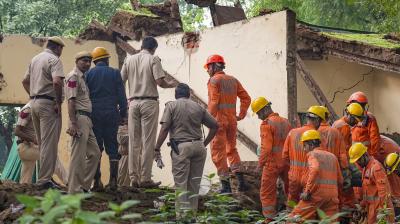 New Delhi: Police, fire and rescue personnel during a rescue operation after a portion of Humanyun's Tomb collapsed, at Nizamuddin area, in New Delhi, Friday, Aug. 15, 2025. (PTI Photo/Karma Bhutia)