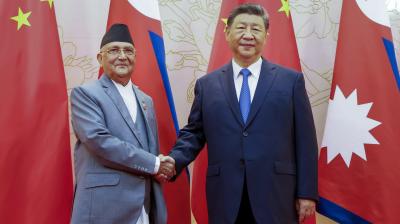 Chinese President Xi Jinping during a meeting with the Nepalese Prime Minister K P Sharma Oli, ahead of the Shanghai Cooperation Organisation (SCO) Summit, in Tianjin, China. (PTI Photo)