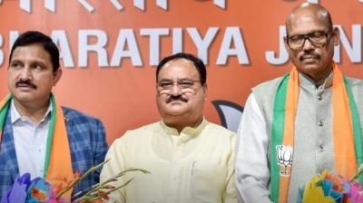 Two TDP MPS who join BJP face cbi ed and it probes