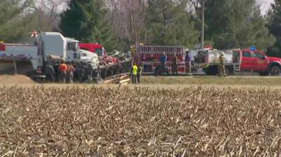 3 children, 2 adults dead after school bus and semitruck collide