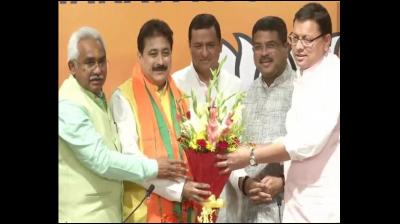 Rajkumar joins BJP at the party's office in Delhi