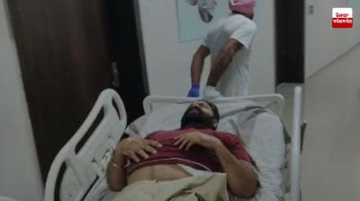 Two masked men on a motorcycle shot a man