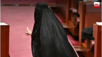 Australian senator arrives at parliament wearing a burqa